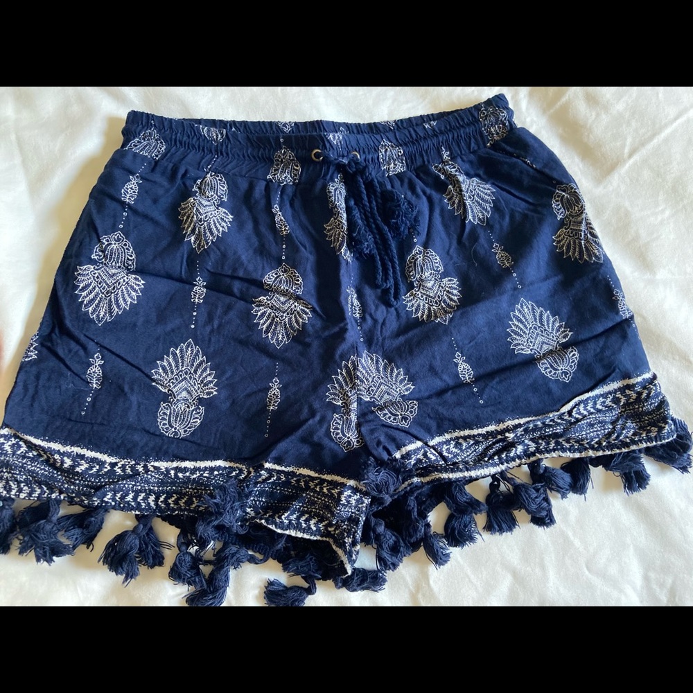 Francescas/ Blue Rain: drawstring flowy shorts that are blue and white